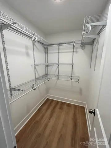 a view of a room with racks on the wall