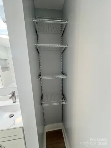 a bathroom with a sink and shower