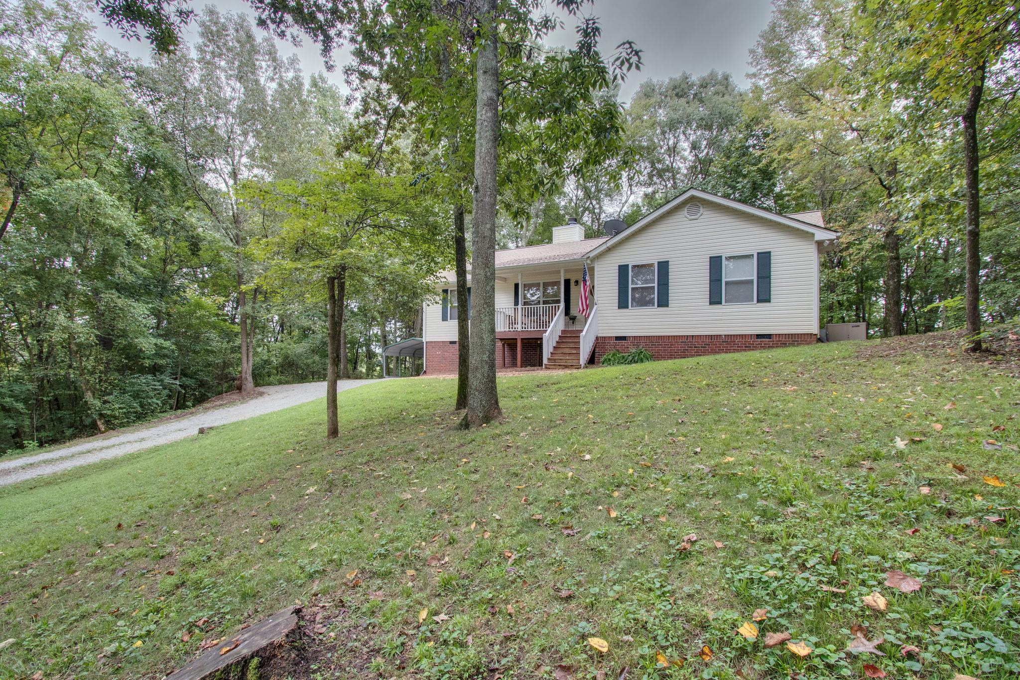 2010 Belotes Ferry Road Lebanon, TN 37087 - Photo 2 of 27 a view of a house with a backyard