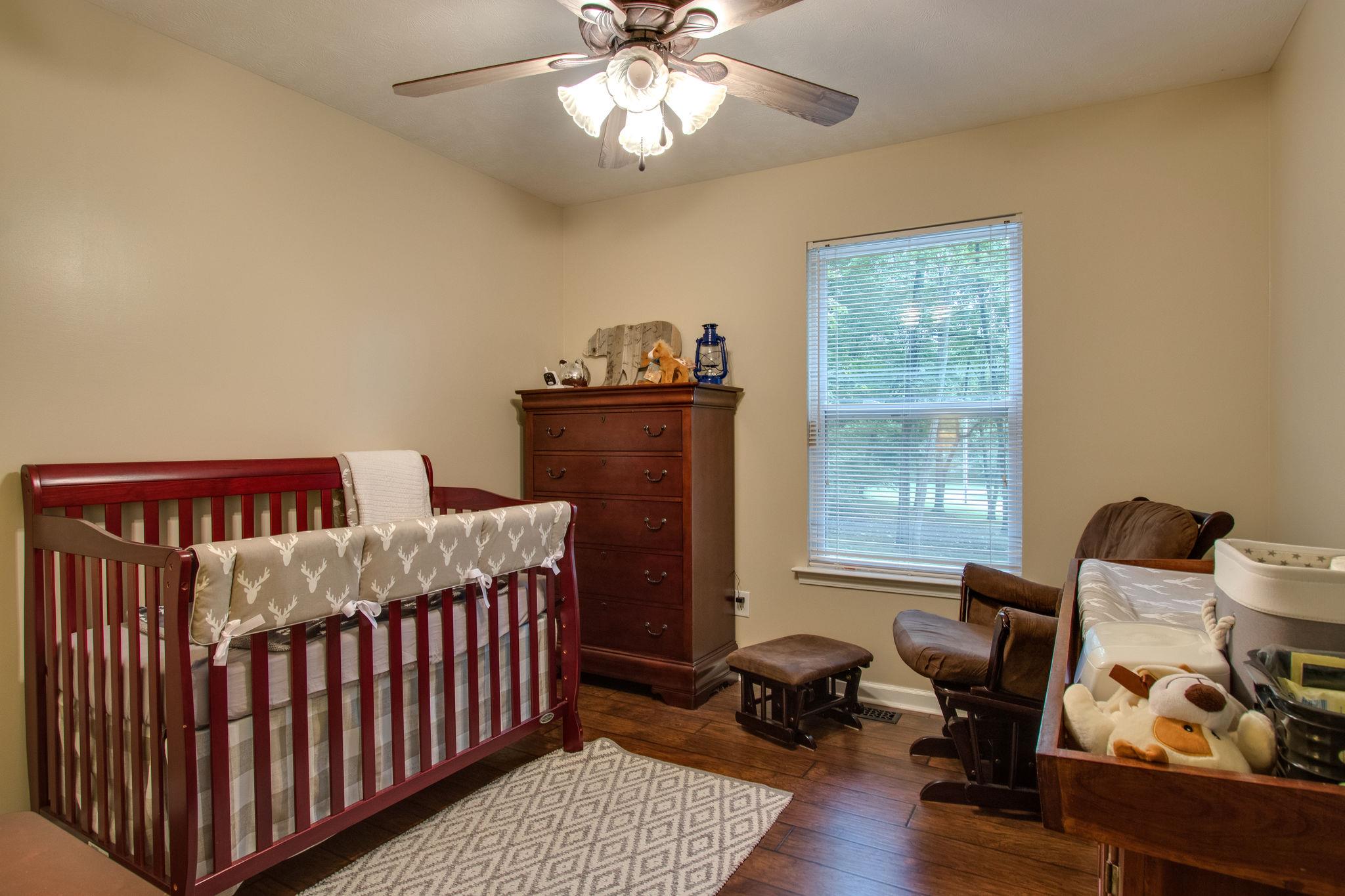 2010 Belotes Ferry Road Lebanon, TN 37087 - Photo 19 of 27 a bedroom with furniture and a window
