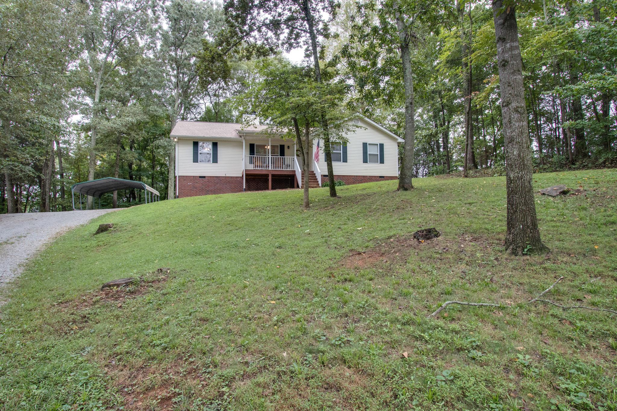 2010 Belotes Ferry Road Lebanon, TN 37087 - Photo 3 of 27 a front view of a house with a yard