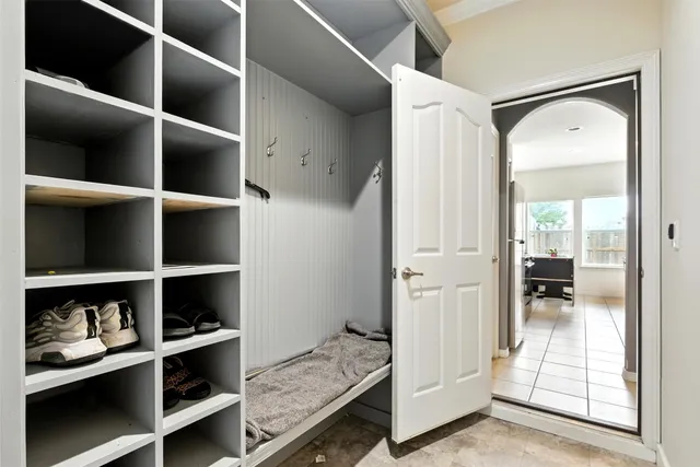 a view of livingroom with cabinet and floor to ceiling window