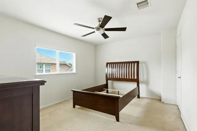 a living room with a couch and a window