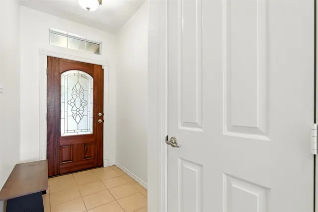 a view of front door with a vanity