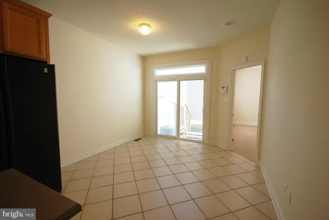 a view of an empty room and window