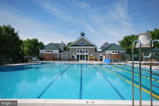 a front view of house with yard and outdoor seating