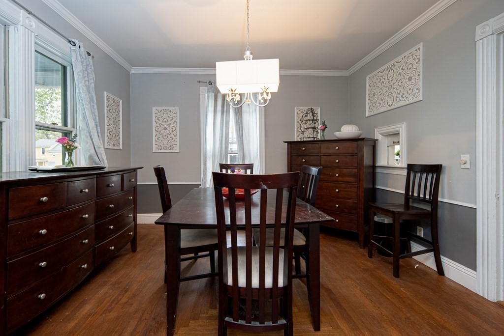 1571 Mendon Road Cumberland, RI 02864 - Photo 12 of 26 a view of a a dining room with furniture window and wooden floor