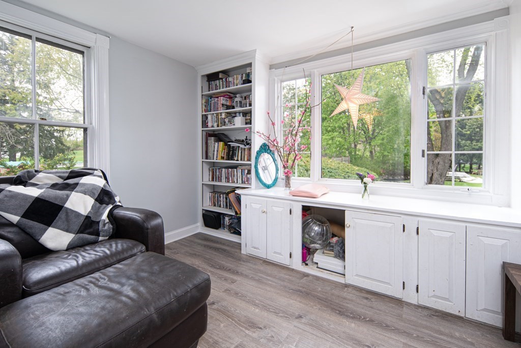 1571 Mendon Road Cumberland, RI 02864 - Photo 20 of 26 a living room with furniture and a large window