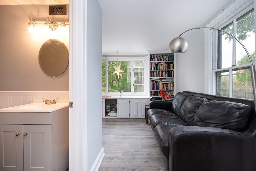 1571 Mendon Road Cumberland, RI 02864 - Photo 21 of 26 a living room with furniture and a window