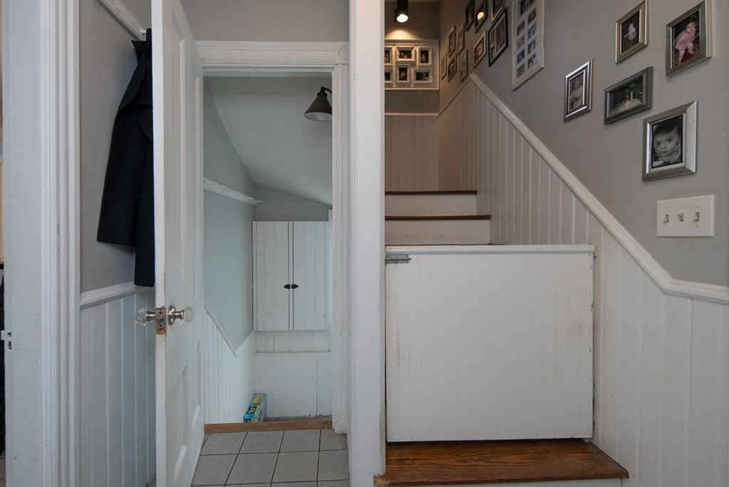 1571 Mendon Road Cumberland, RI 02864 - Photo 5 of 26 a view of an entryway with staircase