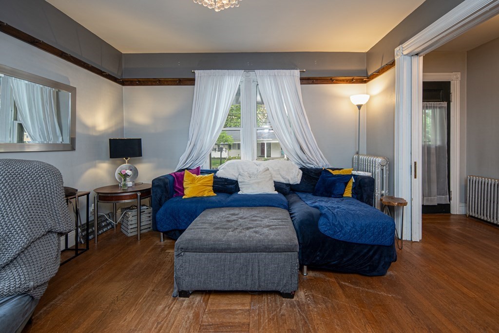 1571 Mendon Road Cumberland, RI 02864 - Photo 7 of 26 a living room with furniture and a window