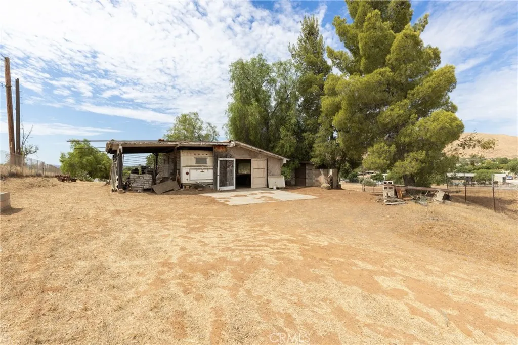 21639 Ellis Perris, CA 92570 - Photo 9 of 40 View from driveway to existing structure on upper level.