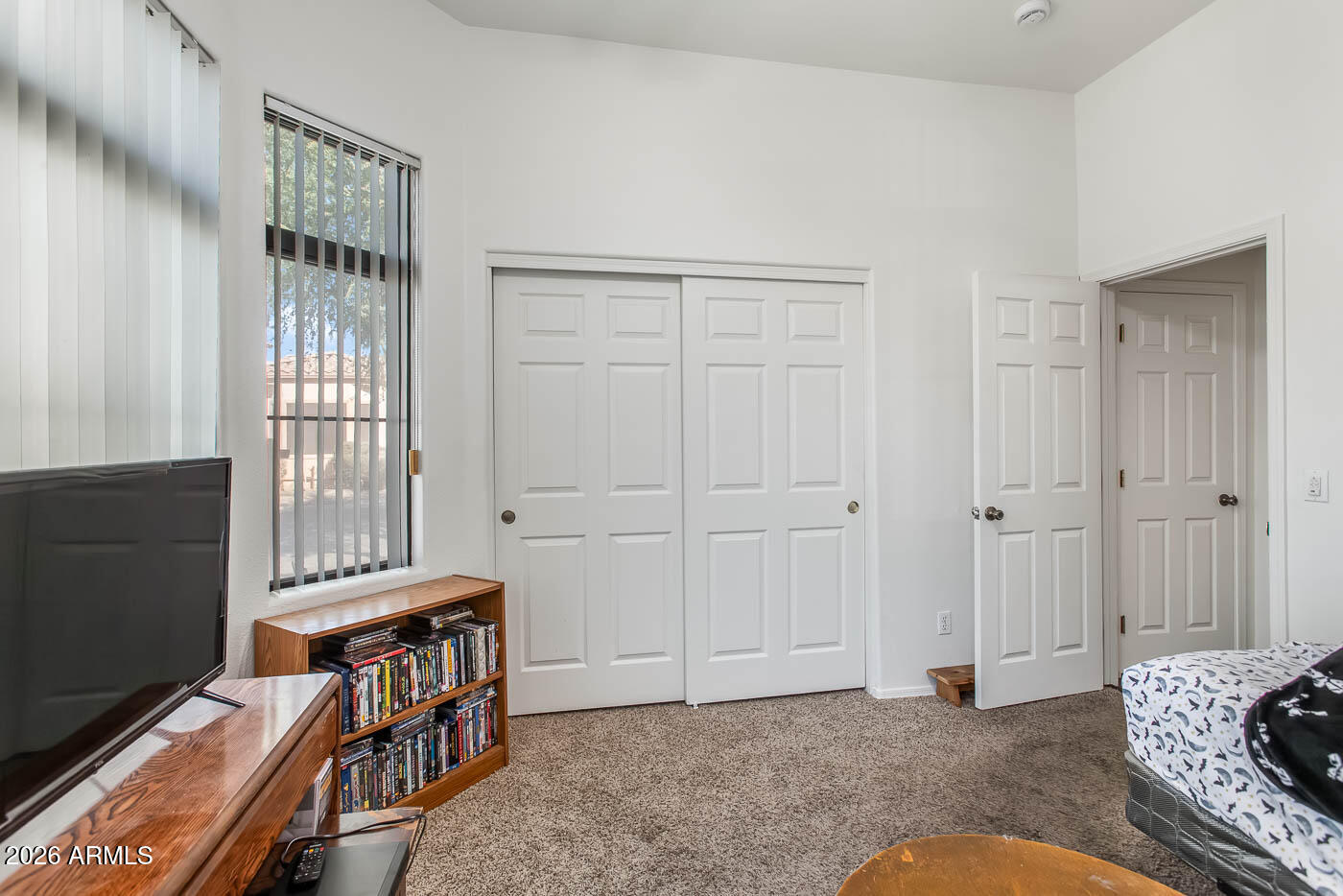 1425 South Lindsay Road, Unit 59 Mesa, AZ 85204 - Photo 18 of 23 a livingroom with furniture and staircase