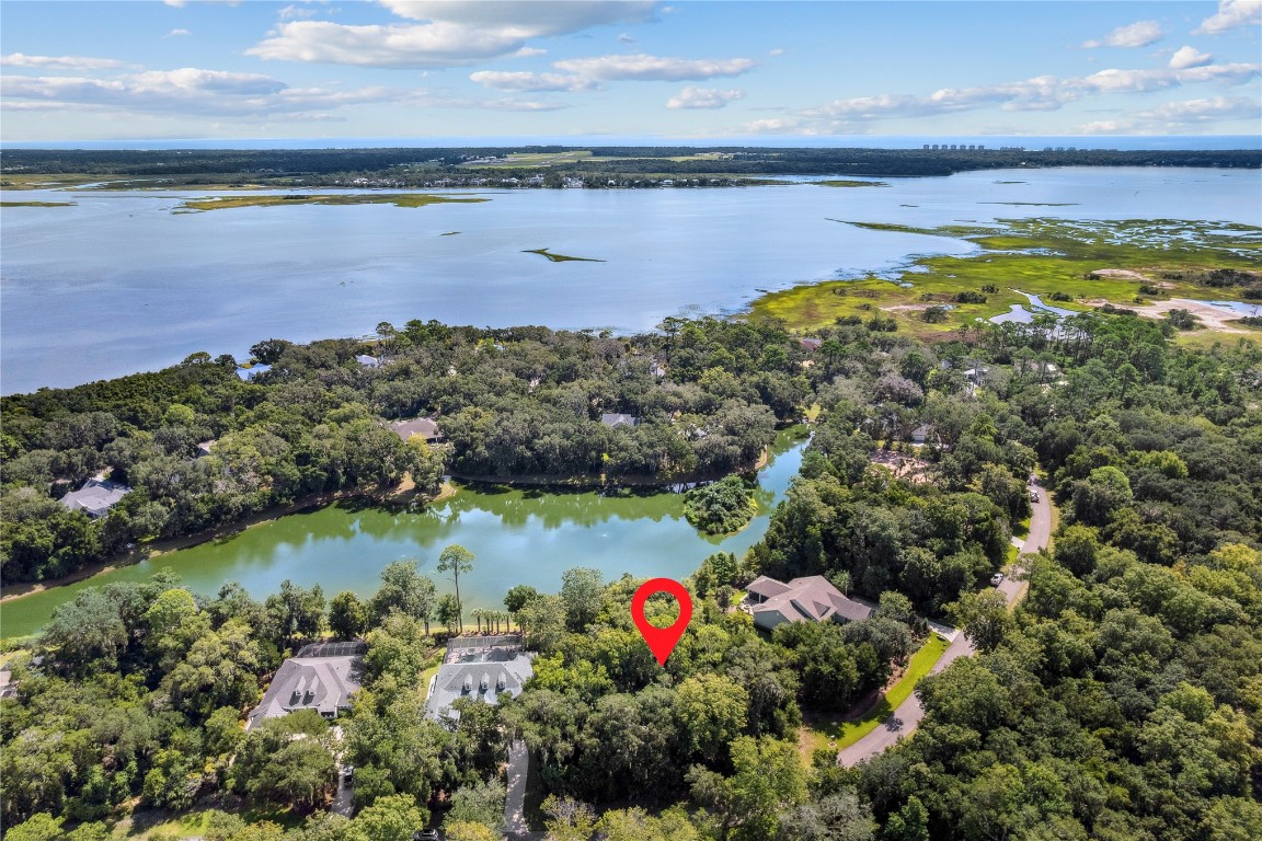 95164 Shell Midden Lane Fernandina Beach, FL 32034 - Photo 13 of 28 a view of a lake with a city