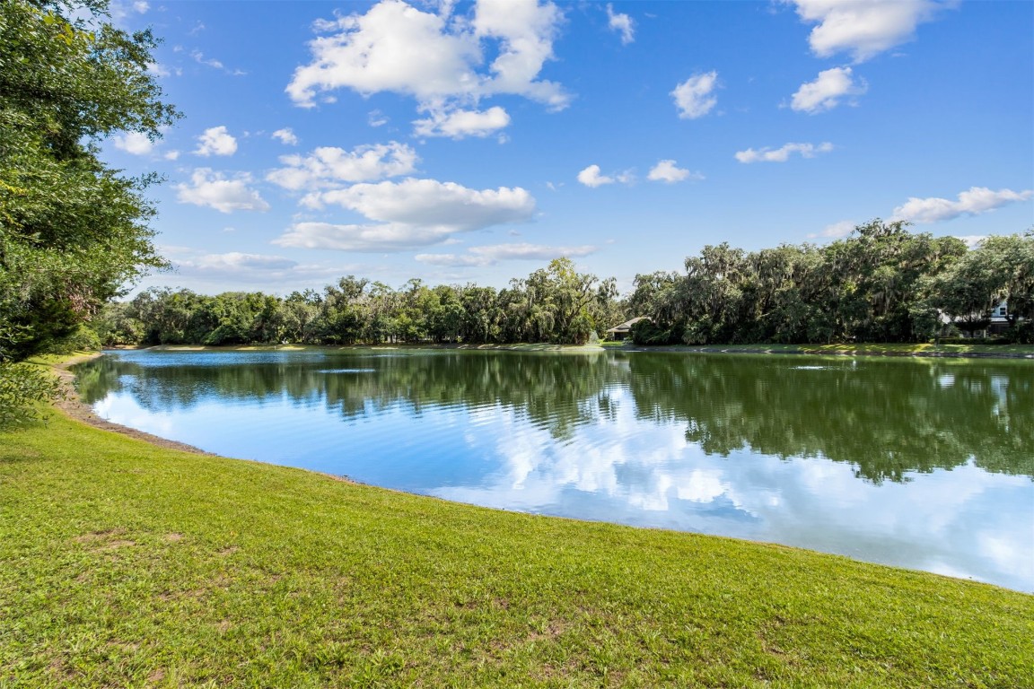 95164 Shell Midden Lane Fernandina Beach, FL 32034 - Photo 6 of 28 a view of a lake in between the city and lake