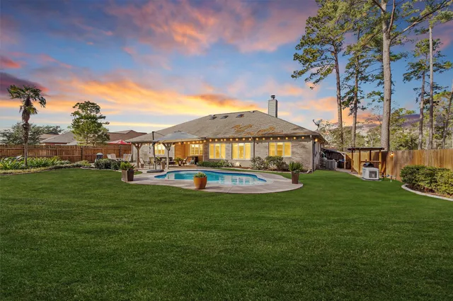 a view of a house with a big yard