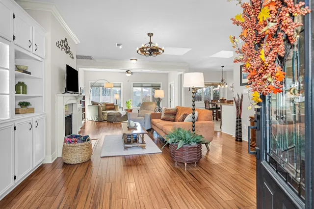 a view of a living room and dining room
