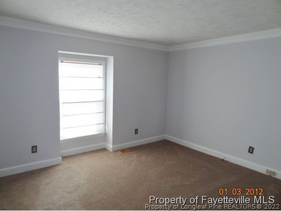 204 Renton Court Fayetteville, NC 28311 - Photo 15 of 25 an empty room with a window