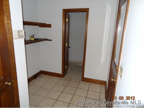 204 Renton Court Fayetteville, NC 28311 - Photo 19 of 25 a view of an empty room and a hallway