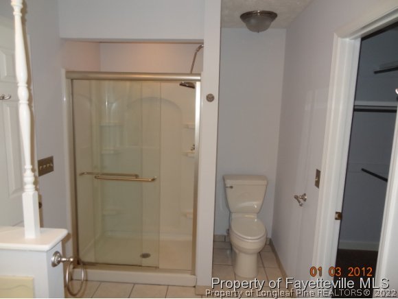 204 Renton Court Fayetteville, NC 28311 - Photo 20 of 25 a bathroom with a toilet and a shower