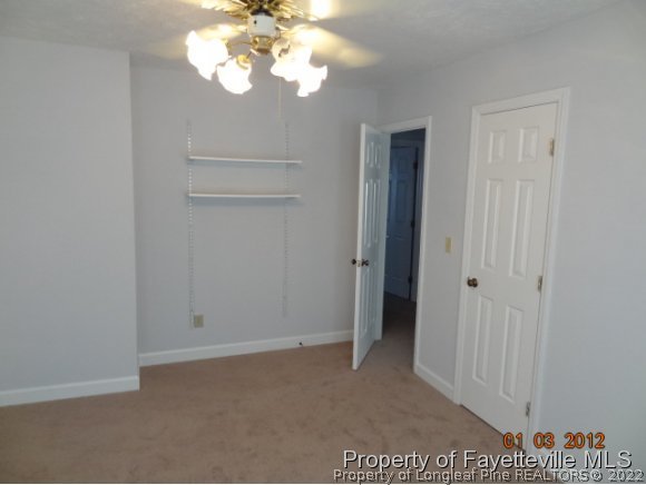 204 Renton Court Fayetteville, NC 28311 - Photo 3 of 25 a view of a chandelier fan in a room