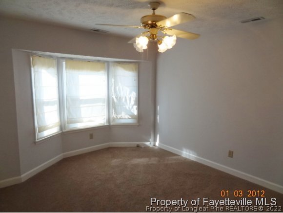 204 Renton Court Fayetteville, NC 28311 - Photo 4 of 25 a view of an empty room with a window