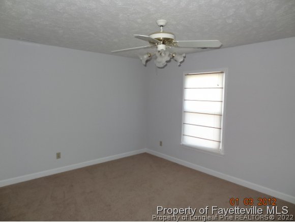 204 Renton Court Fayetteville, NC 28311 - Photo 6 of 25 an empty room with a window