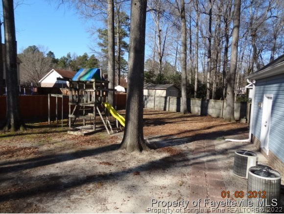 204 Renton Court Fayetteville, NC 28311 - Photo 9 of 25 a view of a park with iron fence