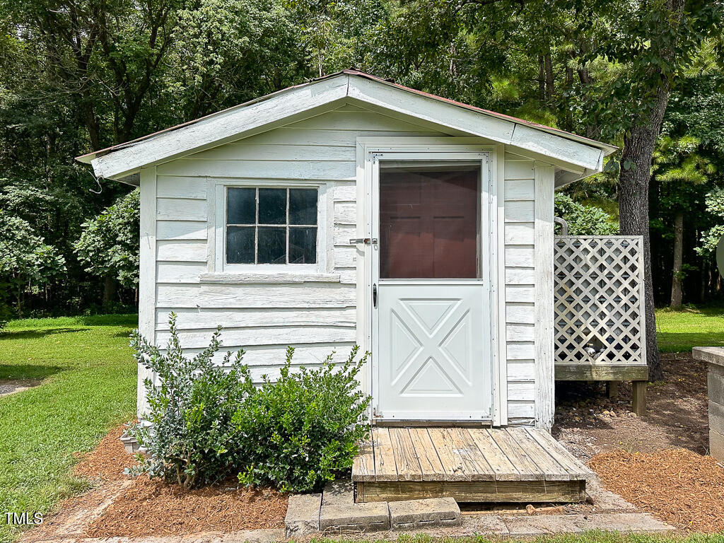 487 Rifle Range Road Warrenton, NC 27589 - Photo 50 of 56 10'4x12'5 Storage Shed