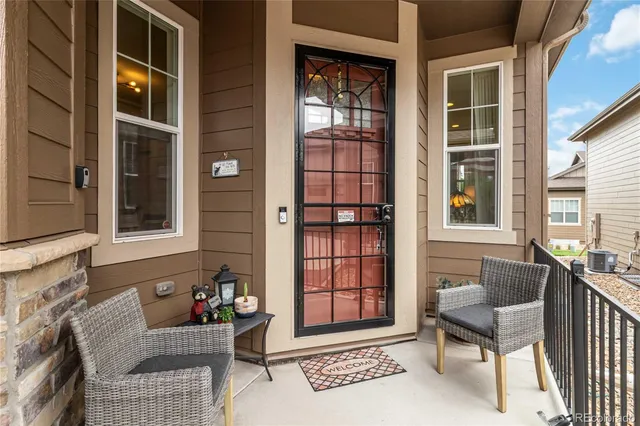 a view of a house and outdoor space and sitting area