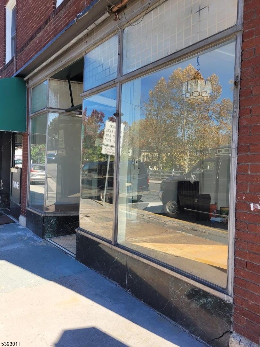 299 Mill Street, Unit 1 Belvidere, NJ 07823 - Photo 4 of 5 a view of a living room with a large window and front door