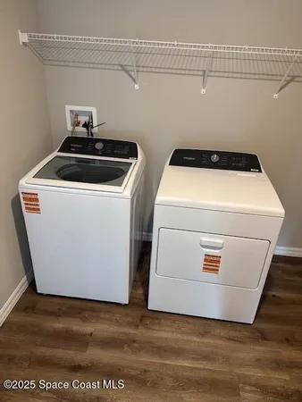 a utility room with washer and dryer