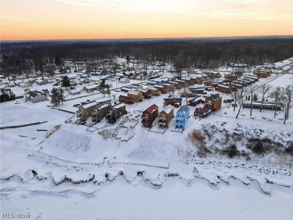 5919 Lake Road West, Unit 32 Ashtabula, OH 44004 - Photo 23 of 23 Aerial view at dusk of a residential view