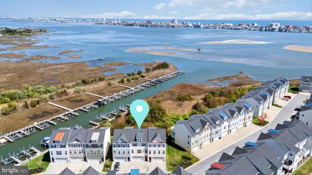 a view of balcony with seating space and city view