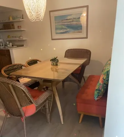 a view of a dining room with furniture