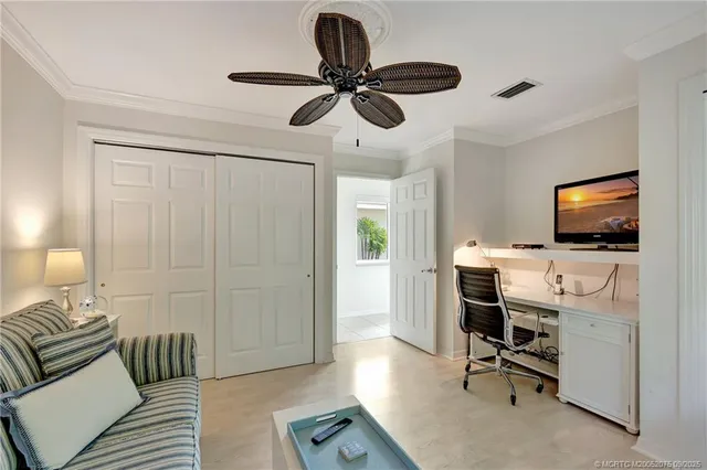 a view of workspace with a flat screen tv