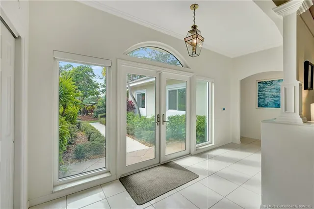 a view of an entryway with wooden floor