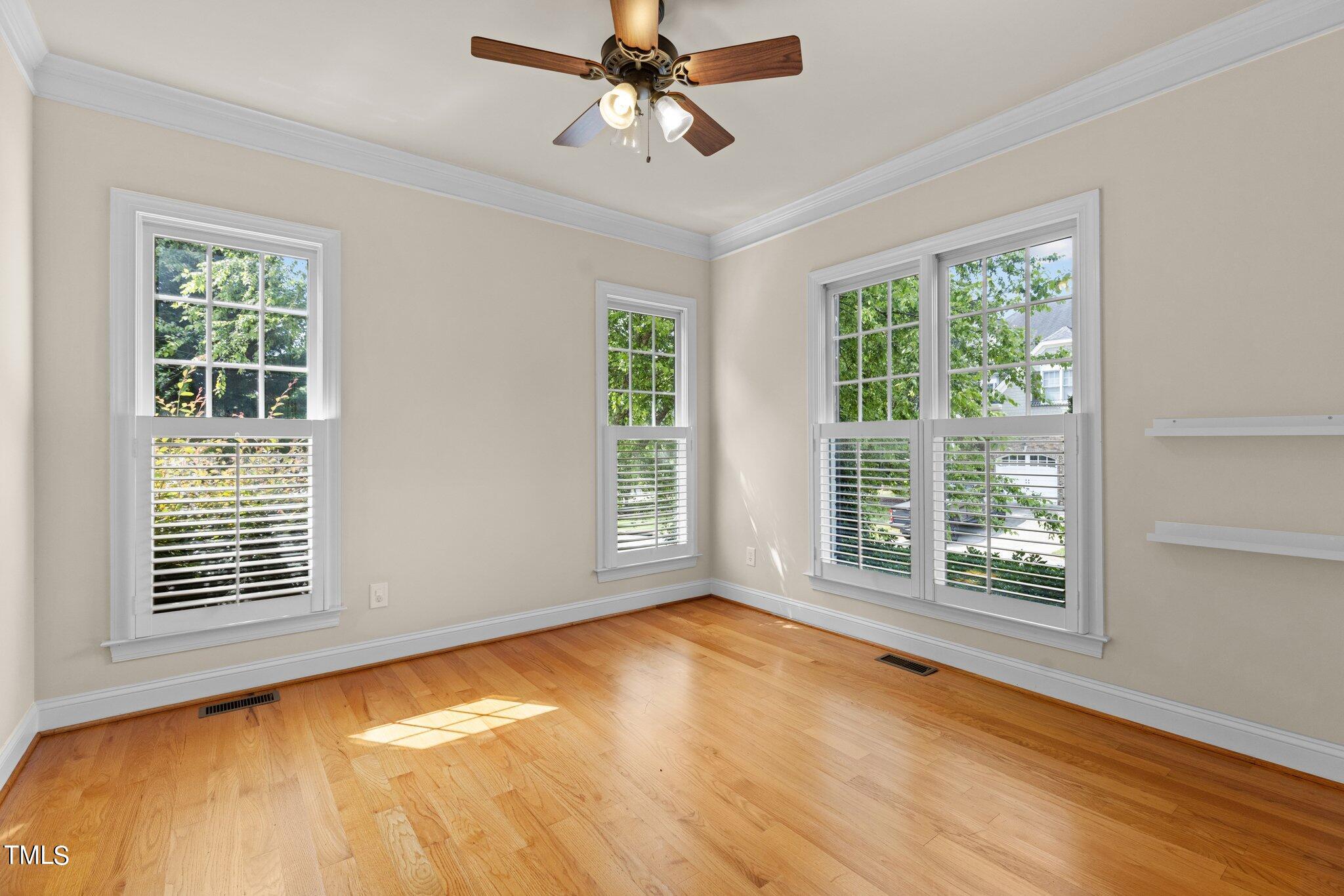12228 Beestone Lane Raleigh, NC 27614 - Photo 8 of 36 a view of an empty room with a window