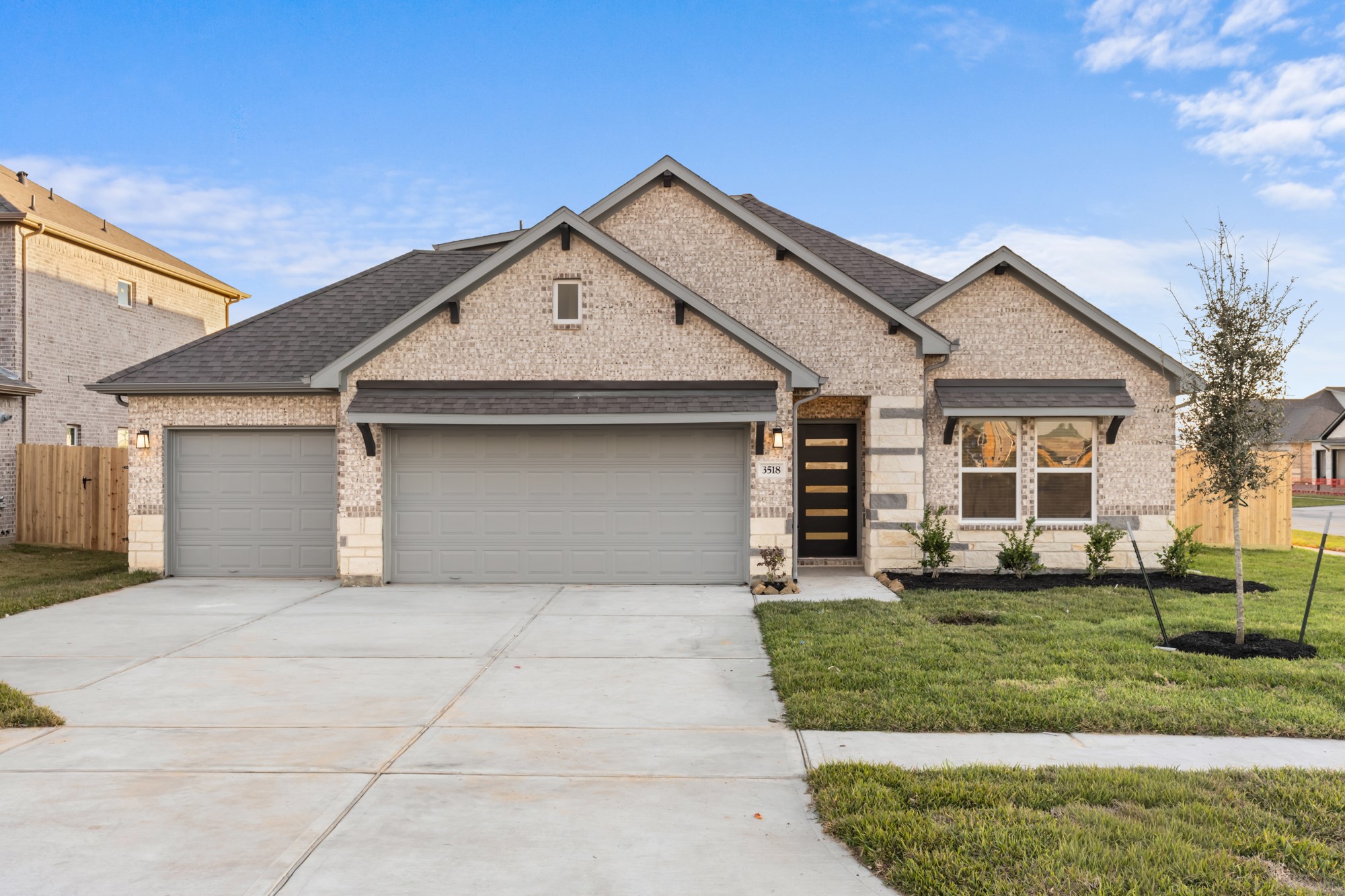 3518 Windmill Palm Manvel, TX 77578 - Photo 1 of 21 a front view of a house with a yard