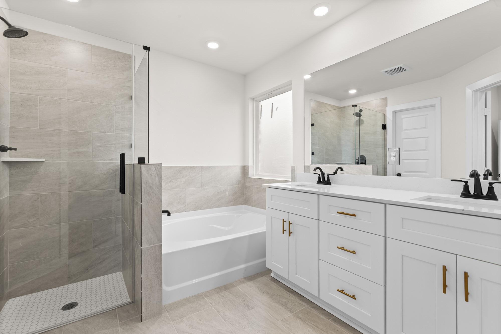 3518 Windmill Palm Manvel, TX 77578 - Photo 12 of 21 a bathroom with a tub sink shower and mirror