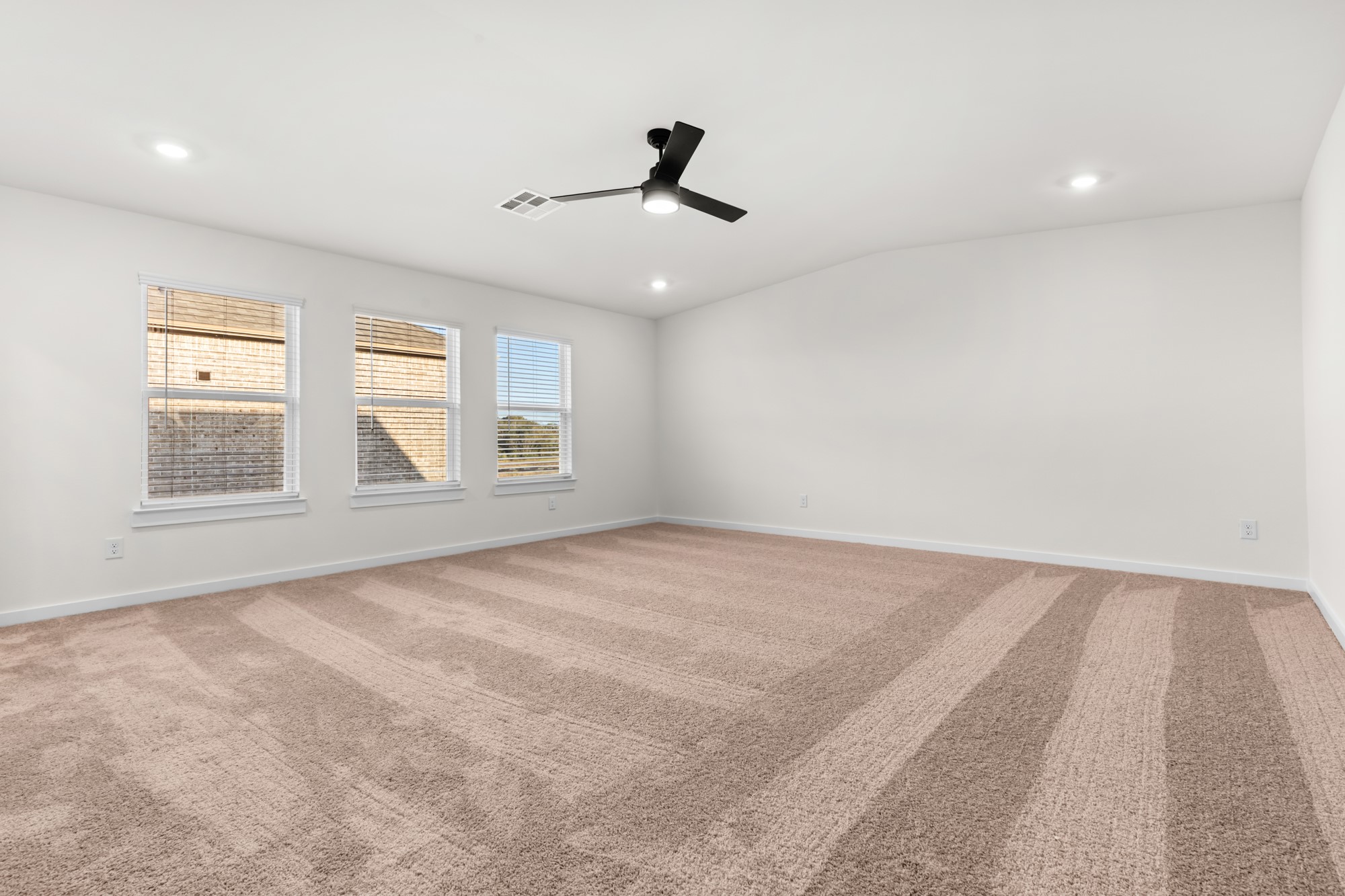 3518 Windmill Palm Manvel, TX 77578 - Photo 13 of 21 an empty room with windows and ceiling fan