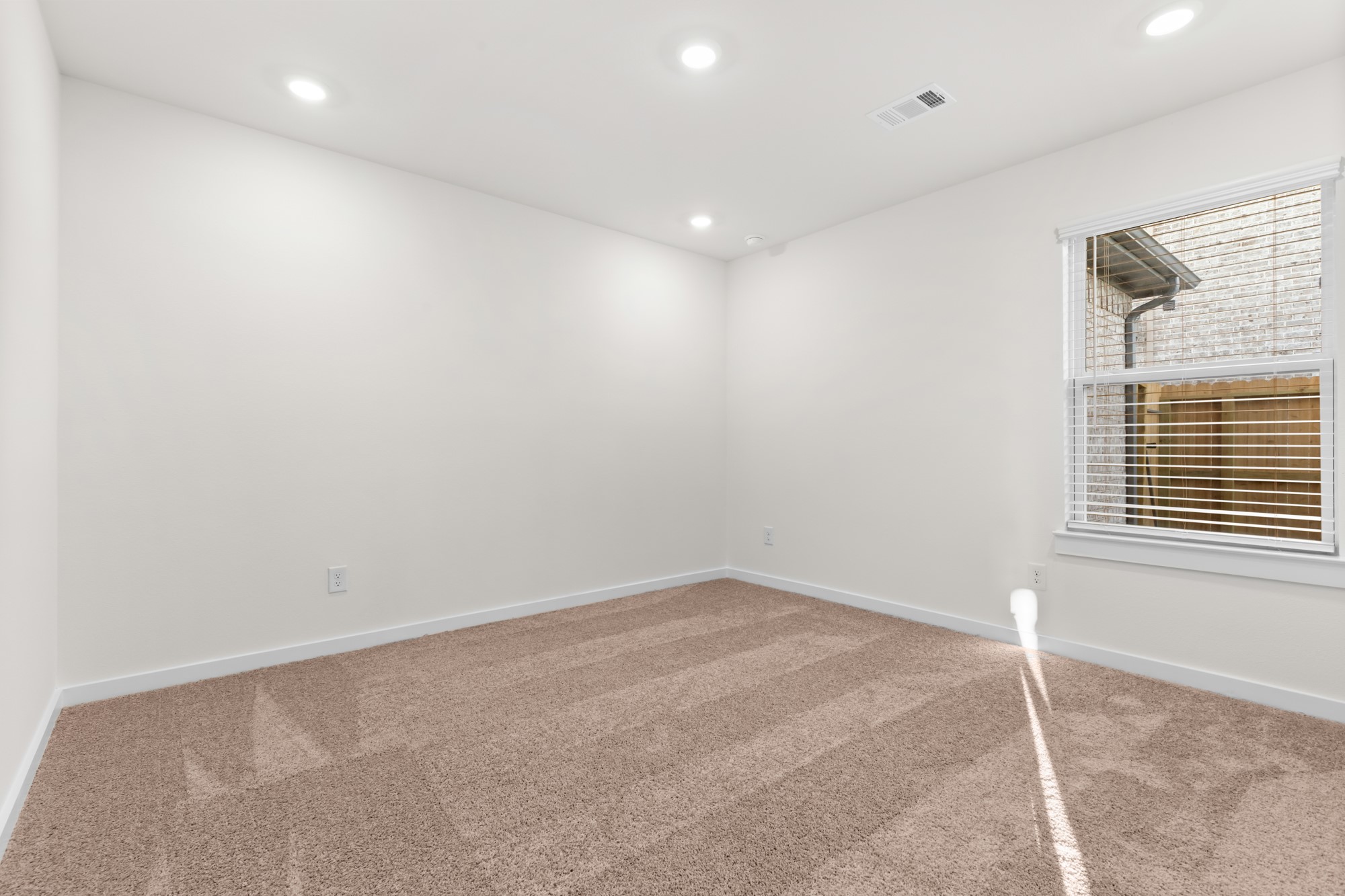3518 Windmill Palm Manvel, TX 77578 - Photo 16 of 21 a view of an empty room with a window
