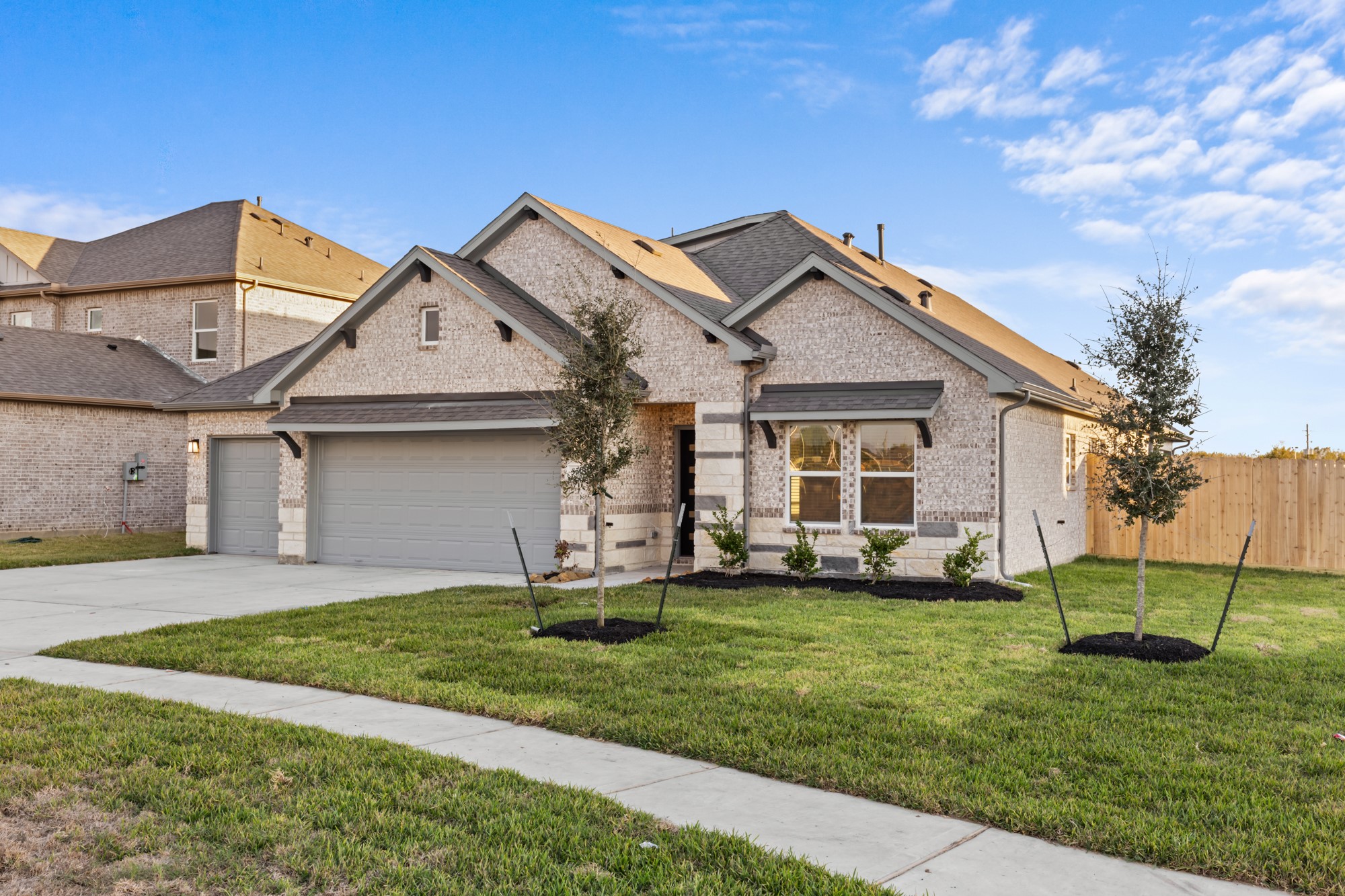 3518 Windmill Palm Manvel, TX 77578 - Photo 21 of 21 a front view of a house with a yard and garage