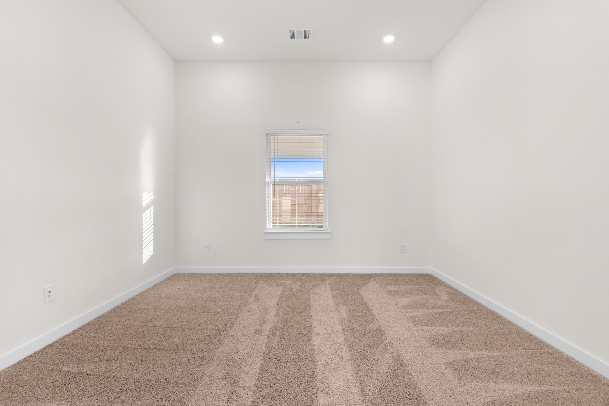 3518 Windmill Palm Manvel, TX 77578 - Photo 10 of 21 an empty room with a window