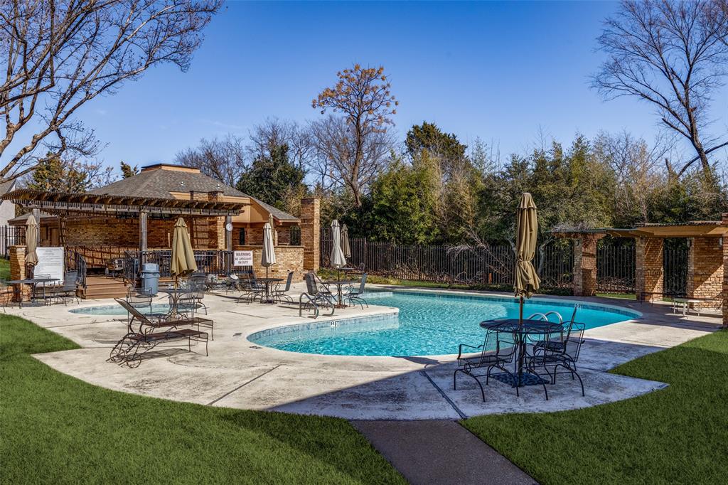 9838 Baseline Drive Dallas, TX 75243 - Photo 30 of 33 a view of a house with backyard porch and sitting area