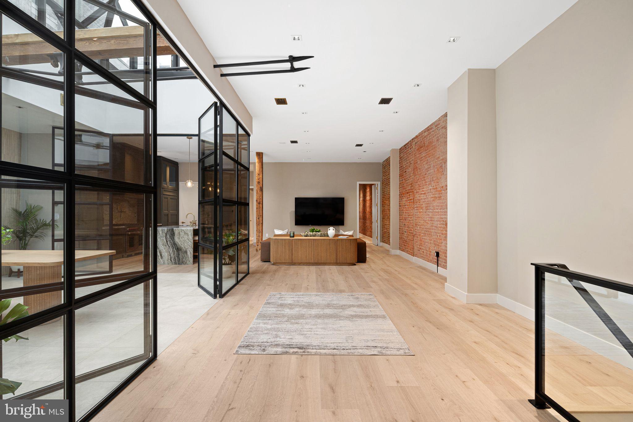 2017 Sansom Street Philadelphia, PA 19103 - Photo 16 of 51 a view of a hallway with wooden floor and staircase