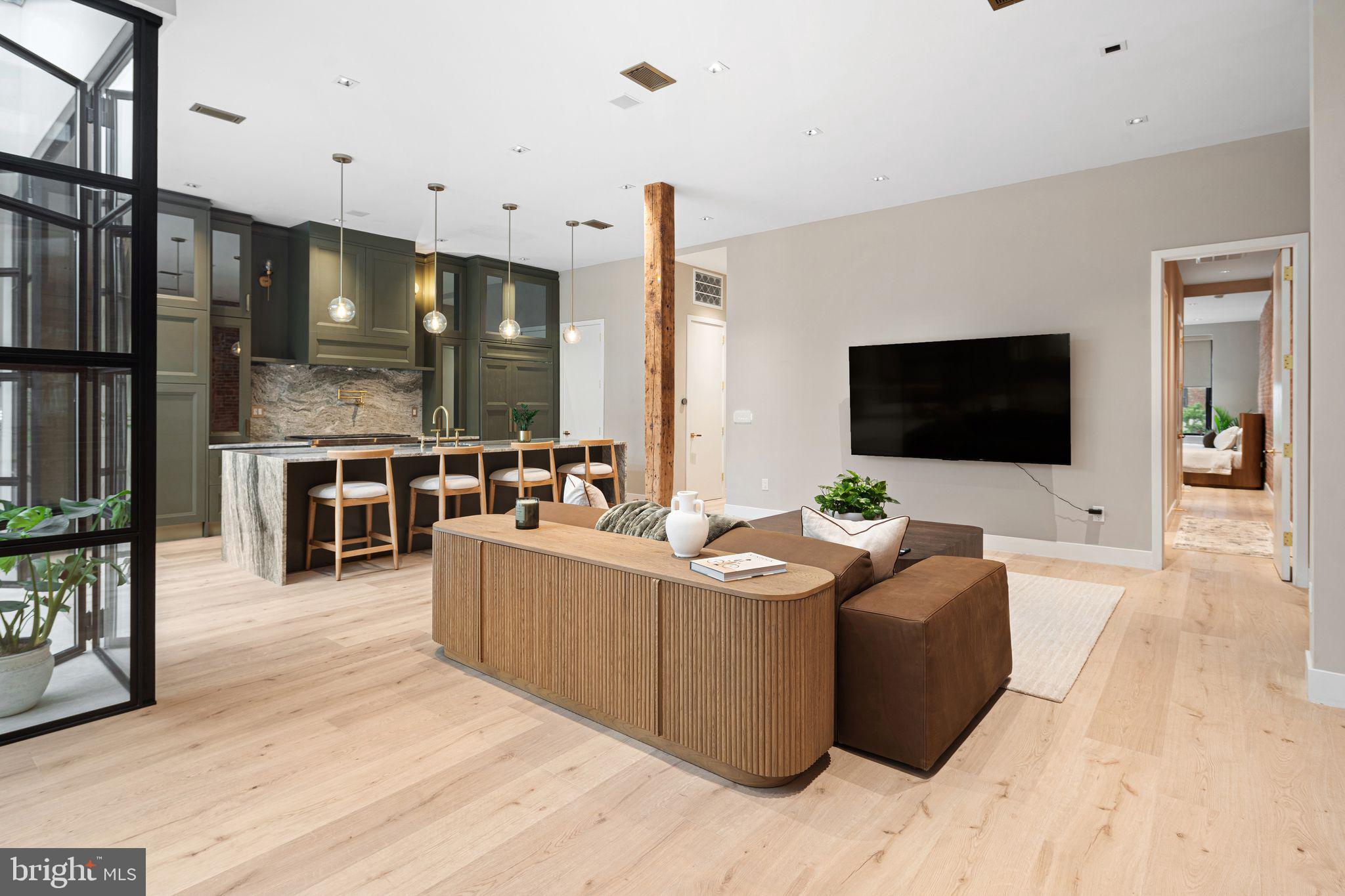 2017 Sansom Street Philadelphia, PA 19103 - Photo 5 of 51 a living room with furniture and a flat screen tv