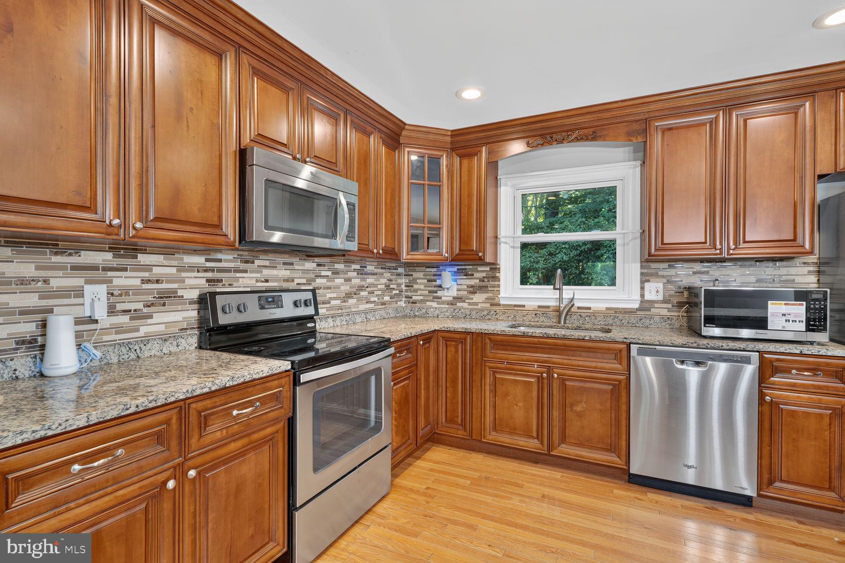 6223 Rathlin Drive Springfield, VA 22152 - Photo 9 of 27 Stainless steel appliances and upgraded cabinets