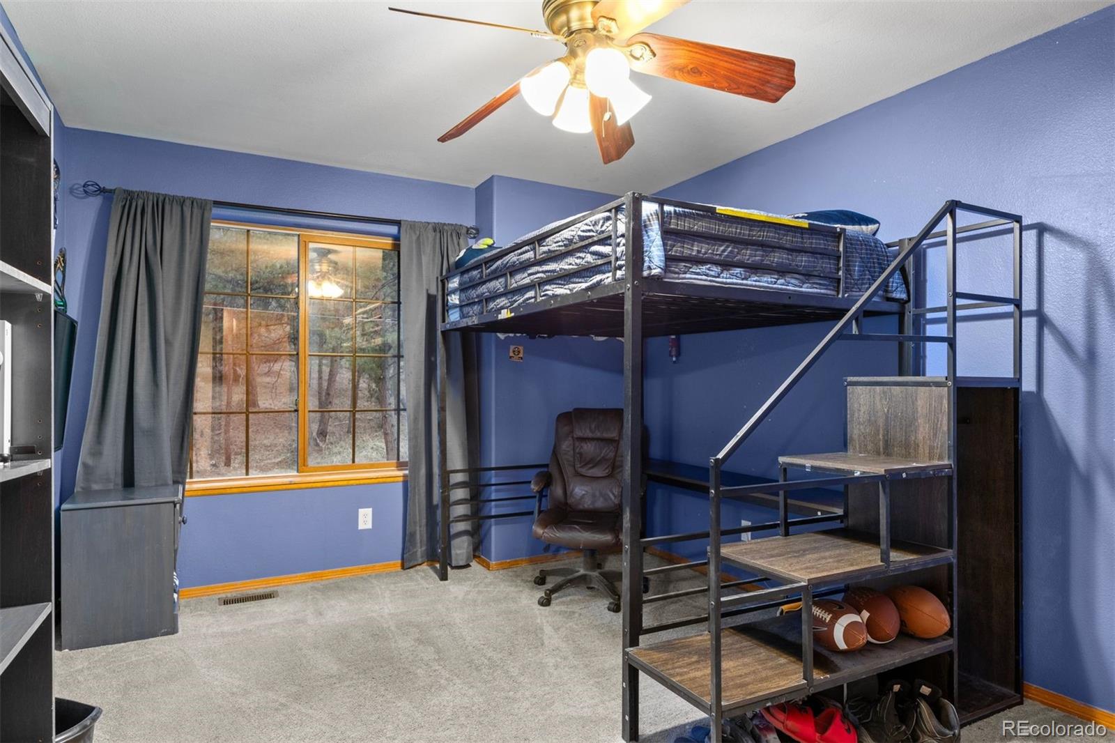3154 South Piney Ridge Road Evergreen, CO 80439 - Photo 28 of 49 a view of a room with gym equipment
