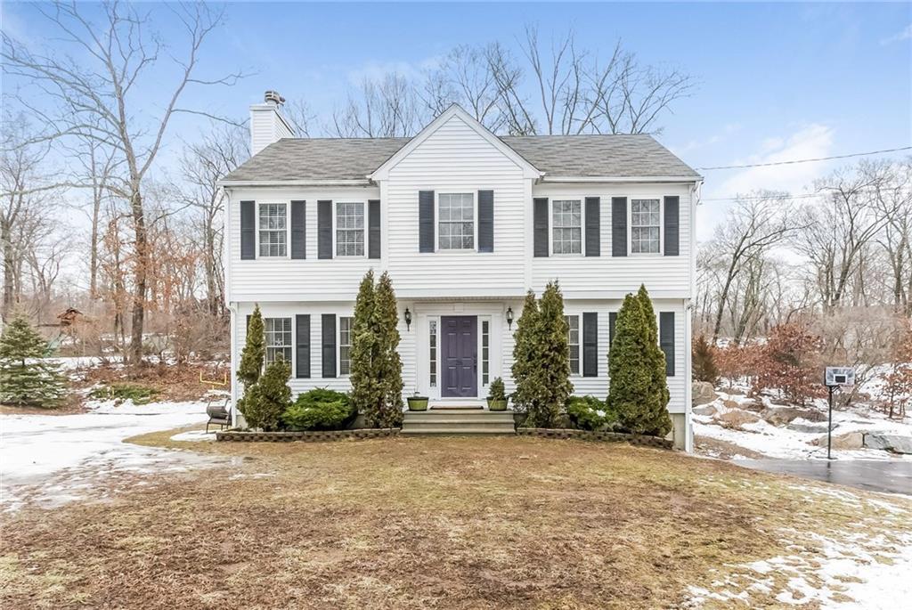 26 River Road Clinton, CT 06413 - Photo 1 of 1 a front view of a house with a yard